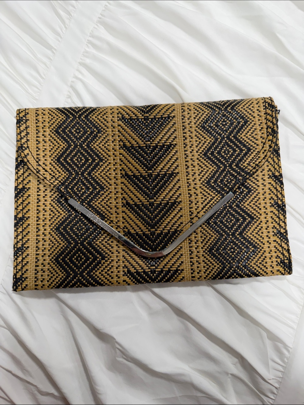 BCBGeneration Black and Tan Woven Envelope Clutch